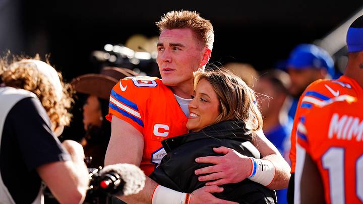 Jan 4, 2026; Denver, Colorado, USA; Denver Broncos quarterback Bo Nix (10) hugs wife, Izzy Nix before the game against the Los Angeles Chargers at Empower Field at Mile High. Jan 4, 2026; Denver, Colorado, USA; Denver Broncos quarterback Bo Nix (10) hugs wife, Izzy Nix before the game against the Los Angeles Chargers at Empower Field at Mile High.