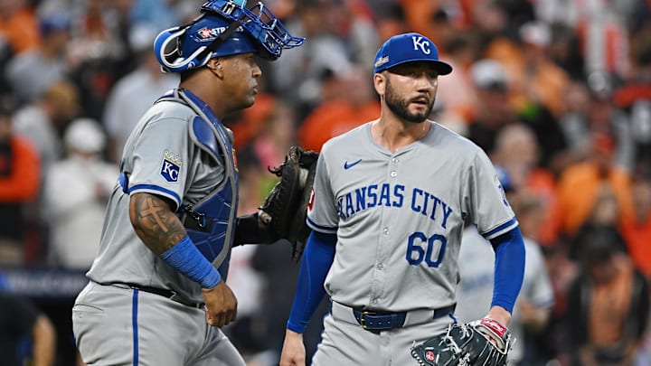 Oct 1, 2024; Baltimore, Maryland, USA; Kansas City Royals pitcher Lucas Erceg (60) and Kansas City Royals catcher Salvador Perez (13) celebrate after defeating the Baltimore Orioles in game one of the Wild Card round for the 2024 MLB Playoffs at Oriole Park at Camden Yards. Mandatory Credit: Tommy Gilligan-Imagn Images
