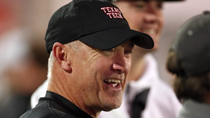 Dec 27, 2024; Memphis, TN, USA; Texas Tech Red Raiders head coach Joey McGuire looks on during warm ups prior to the game against the Arkansas Razorbacks at Simmons Bank Liberty Stadium. Mandatory Credit: Petre Thomas-Imagn Images