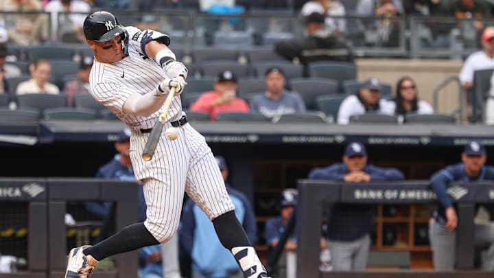 May 4, 2025; Bronx, New York, USA; New York Yankees right fielder Aaron Judge (99) doubles during the eighth inning against the Tampa Bay Rays at Yankee Stadium. 