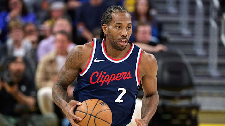 Apr 13, 2025; San Francisco, California, USA; LA Clippers forward Kawhi Leonard (2) brings the ball up court against the Golden State Warriors during the third quarter at Chase Center. Mandatory Credit: Robert Edwards-Imagn Images