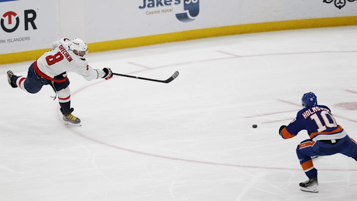 Apr 6, 2025; Elmont, New York, USA; Washington Capitals left wing Alex Ovechkin (8) scores a goal in the 2nd period against the New York Islanders at UBS Arena. The goal is the 895th of Ovechkin’s career, breaking the NHL all-time career goals record previously held by Wayne Gretzky.at UBS Arena. Mandatory Credit: Geoff Burke-Imagn Images Apr 6, 2025; Elmont, New York, USA; Washington Capitals left wing Alex Ovechkin (8) scores a goal in the 2nd period against the New York Islanders at UBS Arena. The goal is the 895th of Ovechkin’s career, breaking the NHL all-time career goals record previously held by Wayne Gretzky.at UBS Arena. Mandatory Credit: Geoff Burke-Imagn Images
