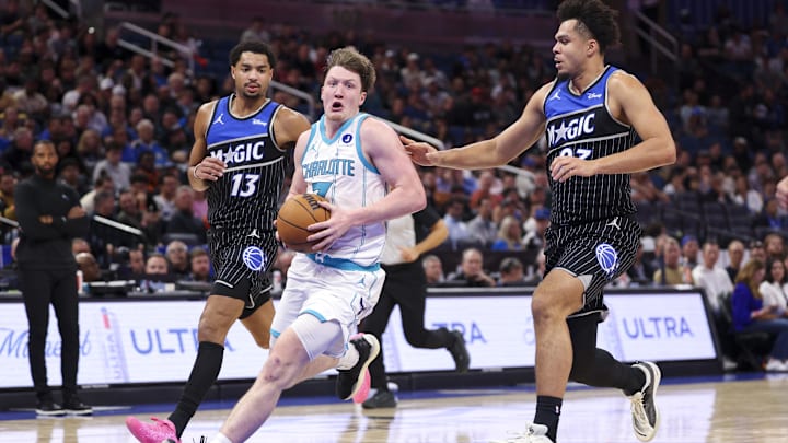 Charlotte Hornets guard Kon Knueppel (7) drives to the basket against the Orlando Magic