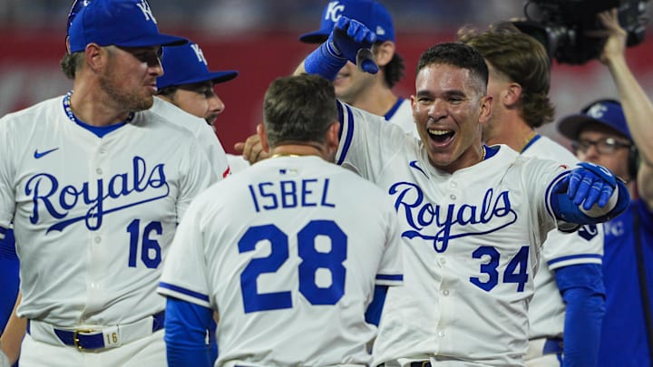 Apr 22, 2025; Kansas City, Missouri, USA; Kansas City Royals catcher Freddy Fermin (34) celebrates with teammates after hitting a walk-off single during the eleventh inning against the Colorado Rockies at Kauffman Stadium. Mandatory Credit: Jay Biggerstaff-Imagn Images Apr 22, 2025; Kansas City, Missouri, USA; Kansas City Royals catcher Freddy Fermin (34) celebrates with teammates after hitting a walk-off single during the eleventh inning against the Colorado Rockies at Kauffman Stadium. Mandatory Credit: Jay Biggerstaff-Imagn Images