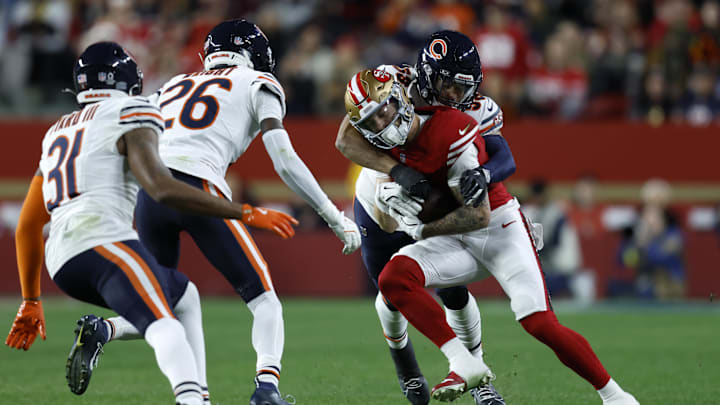 Dec 28, 2025; Santa Clara, California, USA; Chicago Bears offensive tackle Darnell Wright (58) tackles San Francisco 49ers wide receiver Ricky Pearsall (1) in the first half at Levi's Stadium. Mandatory Credit: Sergio Estrada-Imagn Images