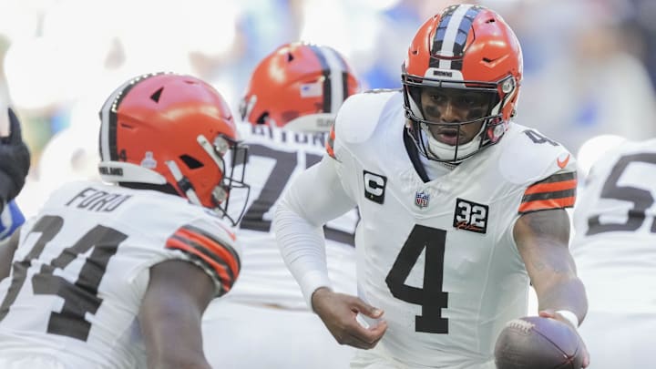 Oct 22, 2023; Indianapolis, Indiana, USA; Cleveland Browns quarterback Deshaun Watson (4) hands the