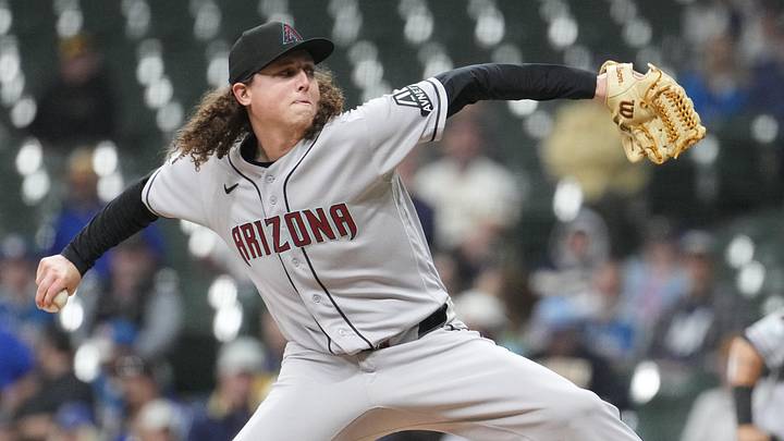 Apr 28, 2026; Milwaukee, Wisconsin, USA; Arizona Diamondbacks pitcher Andrew Hoffmann (56) delivers a pitch against the Milwaukee Brewers in the sixth inning  at American Family Field. Mandatory Credit: Michael McLoone-Imagn Images