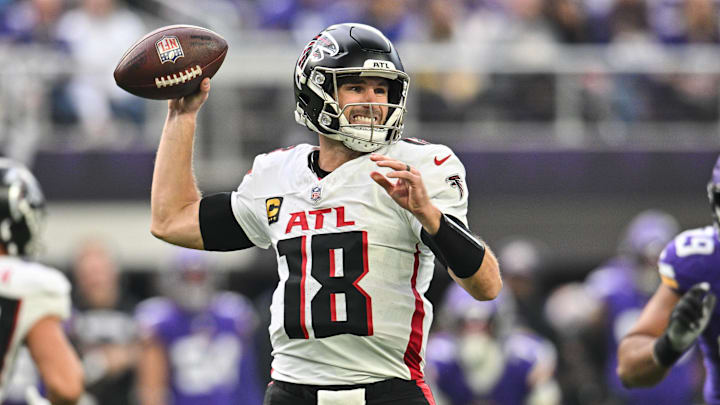 Dec 8, 2024; Minneapolis, Minnesota, USA; Atlanta Falcons quarterback Kirk Cousins (18) throws a pass against the Minnesota Vikings during the second quarter at U.S. Bank Stadium.