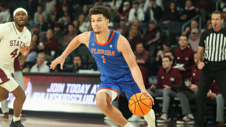 Feb 11, 2025; Starkville, Mississippi, USA; Florida Gators guard Walter Clayton Jr. (1) drives to the basket against the Mississippi State Bulldogs during the first half at Humphrey Coliseum. Mandatory Credit: Wesley Hale-Imagn Images