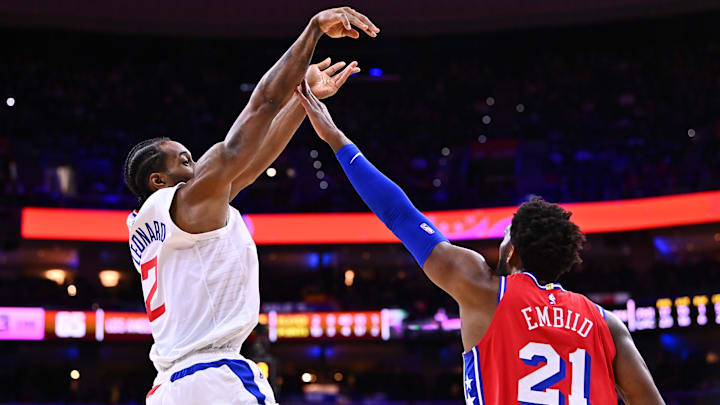 Los Angeles Clippers forward Kawhi Leonard (2) shoots over Philadelphia 76ers center Joel Embiid (21) in the third quarter at Wells Fargo Center. Mandatory Credit: Kyle Ross-Imagn Images