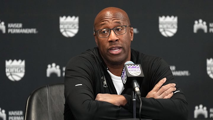 Dec 8, 2024; Sacramento, California, USA; Sacramento Kings head coach Mike Brown talks with media members before the game against the Utah Jazz at Golden 1 Center. Mandatory Credit: Darren Yamashita-Imagn Images