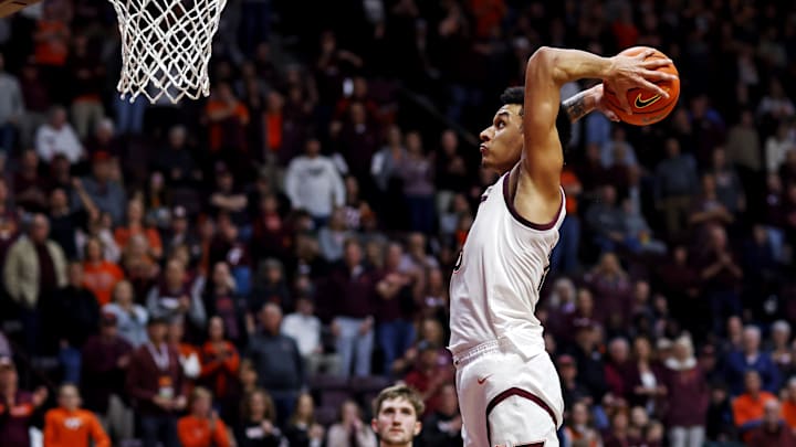 Mar 2, 2024; Blacksburg, Virginia, USA; Virginia Tech Hokies center Lynn Kidd (15) dunks the ball against Wake Forest Demon Deacons forward Andrew Carr (11) during the second half at Cassell Coliseum. Mandatory Credit: Peter Casey-Imagn Images Mar 2, 2024; Blacksburg, Virginia, USA; Virginia Tech Hokies center Lynn Kidd (15) dunks the ball against Wake Forest Demon Deacons forward Andrew Carr (11) during the second half at Cassell Coliseum. Mandatory Credit: Peter Casey-Imagn Images