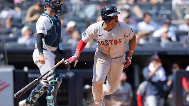 Sep 14, 2024; Bronx, New York, USA; Boston Red Sox third baseman Rafael Devers (11) follows through on a two run single against the New York Yankees during the fifth inning at Yankee Stadium. Mandatory Credit: Brad Penner-Imagn Images Sep 14, 2024; Bronx, New York, USA; Boston Red Sox third baseman Rafael Devers (11) follows through on a two run single against the New York Yankees during the fifth inning at Yankee Stadium. Mandatory Credit: Brad Penner-Imagn Images