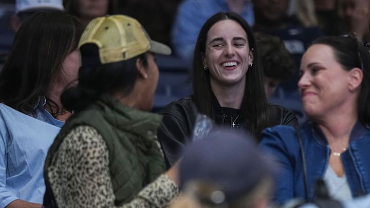 Indiana Fever Caitlin Clark smiles while talking to Butler Bulldogs fans on Monday, Nov. 4, 2024, during the game at Hinkle Fieldhouse in Indianapolis. The Butler Bulldogs defeated the Missouri State Bears, 72-65. Indiana Fever Caitlin Clark smiles while talking to Butler Bulldogs fans on Monday, Nov. 4, 2024, during the game at Hinkle Fieldhouse in Indianapolis. The Butler Bulldogs defeated the Missouri State Bears, 72-65.