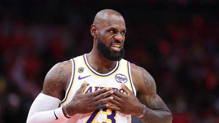 LeBron James walks on the court before the start of the game against the Houston Rockets. LeBron James walks on the court before the start of the game against the Houston Rockets.