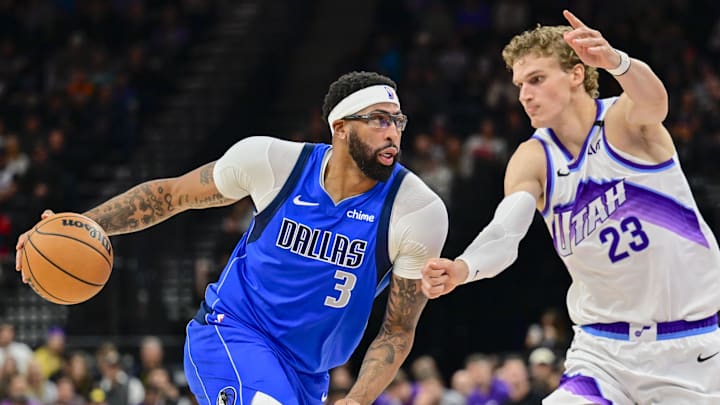 Oct 13, 2025; Salt Lake City, Utah, USA; Dallas Mavericks forward/center Anthony Davis (3) drives to the basket into Utah Jazz forward/center Lauri Markkanen (23) during the second quarter at Delta Center. Mandatory Credit: Peter Creveling-Imagn Images Oct 13, 2025; Salt Lake City, Utah, USA; Dallas Mavericks forward/center Anthony Davis (3) drives to the basket into Utah Jazz forward/center Lauri Markkanen (23) during the second quarter at Delta Center. Mandatory Credit: Peter Creveling-Imagn Images
