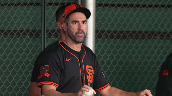 Feb 13, 2025; Scottsdale, AZ, USA; San Francisco Giants pitcher Justin Verlander (35) watches players work out in the bullpen during spring training camp. Feb 13, 2025; Scottsdale, AZ, USA; San Francisco Giants pitcher Justin Verlander (35) watches players work out in the bullpen during spring training camp.