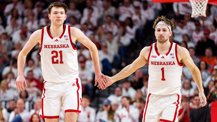 Pryce Sandfort and Sam Hoiberg celebrate after a three-point shot against the Illinois Fighting Illini. Pryce Sandfort and Sam Hoiberg celebrate after a three-point shot against the Illinois Fighting Illini.