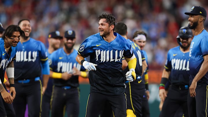 Philadelphia Phillies shortstop Trea Turner celebrates with teammates after his walk-off game-winning RBI single during the ninth inning against the Washington Nationals