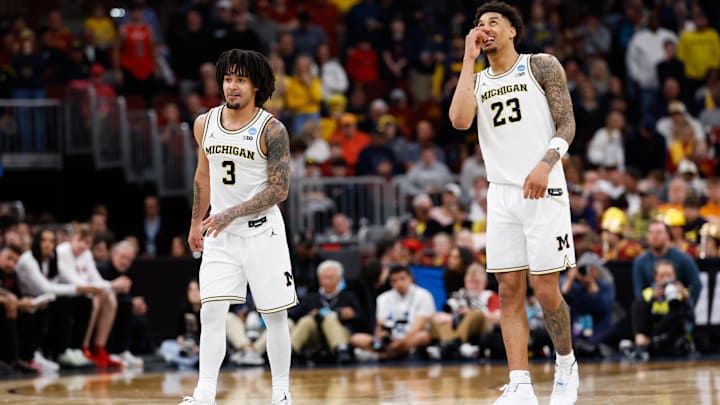 Mar 27, 2026; Chicago, IL, USA; Michigan Wolverines guard Elliot Cadeau (3) and forward Yaxel Lendeborg (23) react in the second half against the Alabama Crimson Tide during a Sweet Sixteen game of the Midwest Regional of the men's 2026 NCAA Tournament at United Center. Mandatory Credit: Kamil Krzaczynski-Imagn Images