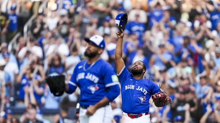 Sep 27, 2025; Toronto, Ontario, CAN; Toronto Blue Jays first base Vladimir Guerrero Jr. (27) celebrates by lifting his hat into the air after defeating the Tampa Bay Rays at Rogers Centre. Mandatory Credit: Kevin Sousa-Imagn Images Sep 27, 2025; Toronto, Ontario, CAN; Toronto Blue Jays first base Vladimir Guerrero Jr. (27) celebrates by lifting his hat into the air after defeating the Tampa Bay Rays at Rogers Centre. Mandatory Credit: Kevin Sousa-Imagn Images