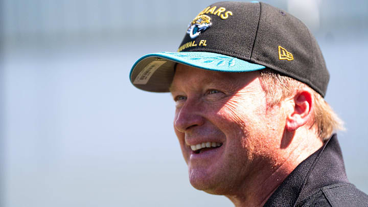 Former NFL Coach Jon Gruden have a laugh while attending an NFL training camp session ten at the Miller Electric Center, Tuesday, Aug. 5, 2025, in Jacksonville, Fla. [Doug Engle/Florida Times-Union]