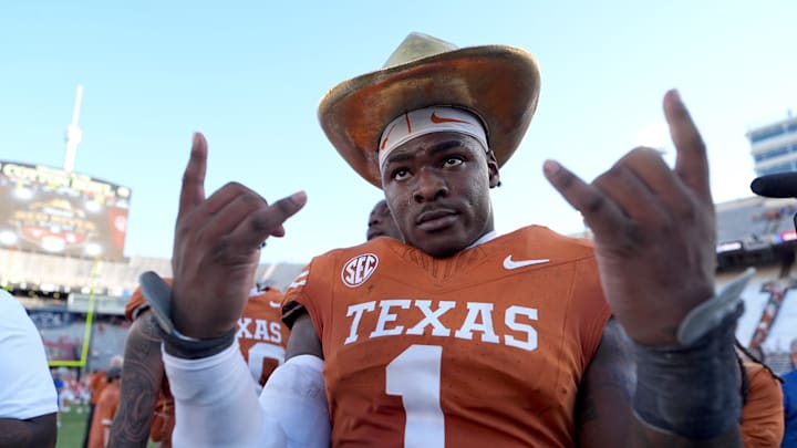 Texas Longhorns defensive end Colin Simmons (1) celebrates with the golden hat following the Red River Rivalry college football game between the University of Oklahoma Sooners and the Texas Longhorn at the Cotton Bowl Stadium in Dallas, Texas, Saturday, Oct. 11, 2025.