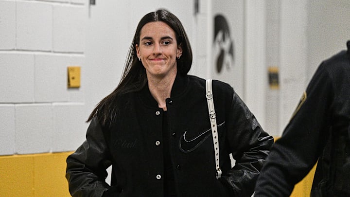 Feb 2, 2025; Iowa City, Iowa, USA; Former Iowa Hawkeyes player Caitlin Clark enters Carver-Hawkeye Arena before the game against the USC Trojans. The Hawkeyes will be retiring the jersey of Clark after the game. Mandatory Credit: Jeffrey Becker-Imagn Images Feb 2, 2025; Iowa City, Iowa, USA; Former Iowa Hawkeyes player Caitlin Clark enters Carver-Hawkeye Arena before the game against the USC Trojans. The Hawkeyes will be retiring the jersey of Clark after the game. Mandatory Credit: Jeffrey Becker-Imagn Images