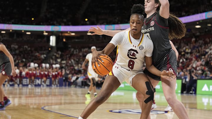 Mar 8, 2025; Greenville, SC, USA; South Carolina Gamecocks forward Joyce Edwards (8) tries to push to the goal against Oklahoma Sooners center Raegan Beers (52) during the second half at Bon Secours Wellness Arena. Mandatory Credit: Jim Dedmon-Imagn Images