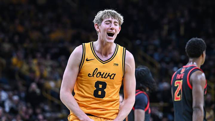 Dec 6, 2025; Iowa City, Iowa, USA; Iowa Hawkeyes forward Cooper Koch (8) reacts during the first half against the Maryland Terrapins at Carver-Hawkeye Arena. Mandatory Credit: Jeffrey Becker-Imagn Images