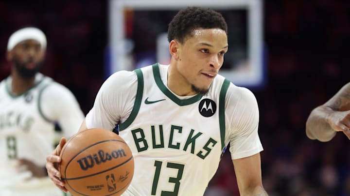 Jan 27, 2026; Philadelphia, Pennsylvania, USA; Milwaukee Bucks guard Ryan Rollins (13) controls the ball against the Philadelphia 76ers during the first quarter at Xfinity Mobile Arena. Mandatory Credit: Bill Streicher-Imagn Images