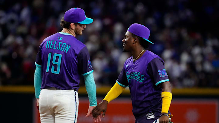 Diamondbacks shortstop Geraldo Perdomo celebrates with pitcher Ryne Nelson (19) after a 3-0 win over the Dodgers at Chase Field on May 10, 2025, in Phoenix. Diamondbacks shortstop Geraldo Perdomo celebrates with pitcher Ryne Nelson (19) after a 3-0 win over the Dodgers at Chase Field on May 10, 2025, in Phoenix.
