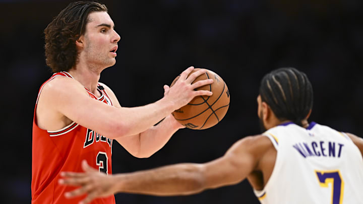 Mar 22, 2025; Los Angeles, California, USA; Chicago Bulls guard Josh Giddey (3) looks to pass against Los Angeles Lakers guard Gabe Vincent (7) during the second half at Crypto.com Arena. Mandatory Credit: Jonathan Hui-Imagn Images Mar 22, 2025; Los Angeles, California, USA; Chicago Bulls guard Josh Giddey (3) looks to pass against Los Angeles Lakers guard Gabe Vincent (7) during the second half at Crypto.com Arena. Mandatory Credit: Jonathan Hui-Imagn Images