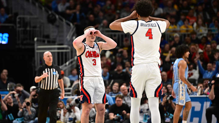 Mar 21, 2025; Milwaukee, WI, USA; Mississippi Rebels guard Sean Pedulla (3) and forward Jaemyn Brakefield (4) celebrate after a play during the first half of a first round NCAA men’s tournament game against the North Carolina Tar Heels at Fiserv Forum. Mandatory Credit: Benny Sieu-Imagn Images Mar 21, 2025; Milwaukee, WI, USA; Mississippi Rebels guard Sean Pedulla (3) and forward Jaemyn Brakefield (4) celebrate after a play during the first half of a first round NCAA men’s tournament game against the North Carolina Tar Heels at Fiserv Forum. Mandatory Credit: Benny Sieu-Imagn Images