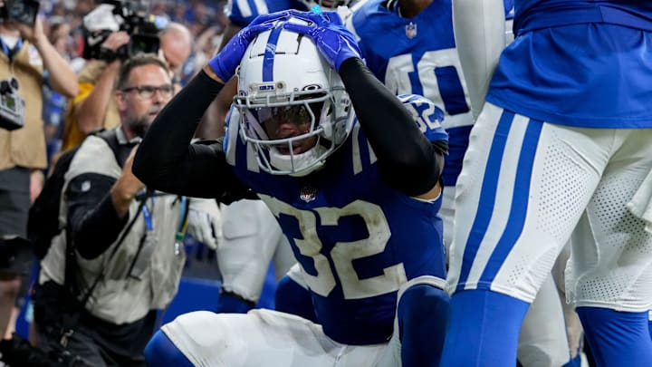 Indianapolis Colts safety Julian Blackmon (32) celebrates an interception by Indianapolis Colts cornerback Jaylon Jones (40) on Sunday, Sept. 22, 2024, during a game against the Chicago Bears at Lucas Oil Stadium in Indianapolis.