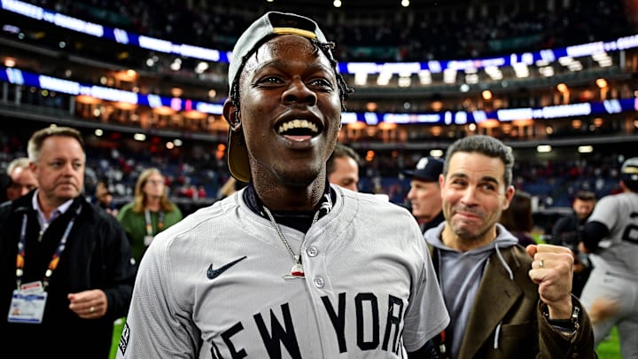 Oct 19, 2024; Cleveland, Ohio, USA; New York Yankees third base Jazz Chisholm Jr. (13) celebrates after beating the Cleveland Guardians during game five of the ALCS for the 2024 MLB playoffs at Progressive Field. Mandatory Credit: David Dermer-Imagn Images