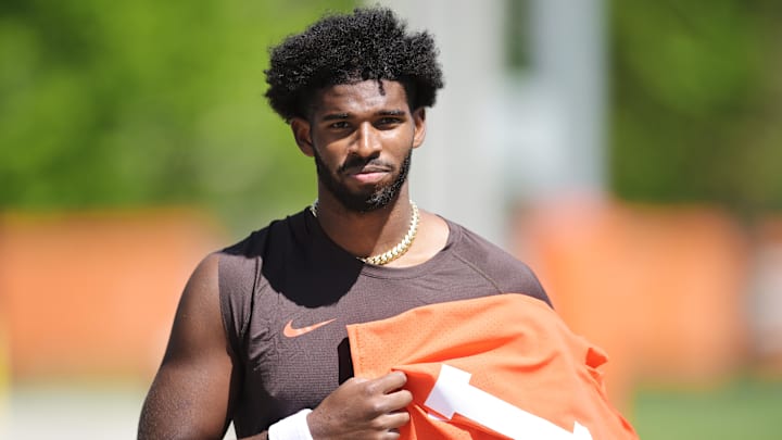 May 9, 2025; Berea, OH, USA; Cleveland Browns quarterback Shedeur Sanders (12) walks off the field after rookie minicamp at CrossCountry Mortgage Campus. Mandatory Credit: Ken Blaze-Imagn Images