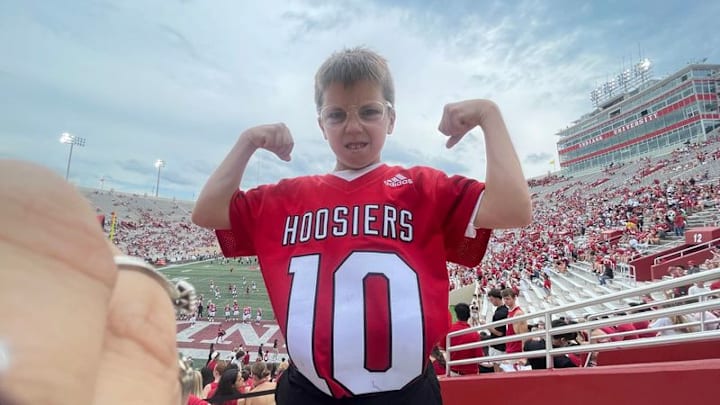Drew Shouse flexes before an Indiana home football game