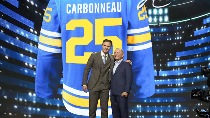 Jun 27, 2025; Los Angeles, California, USA; Justin Carbonneau is selected as the 19th overall pick to the St. Louis Blues in the first round of the 2025 NHL Draft at Peacock Theater. Mandatory Credit: Kirby Lee-Imagn Images