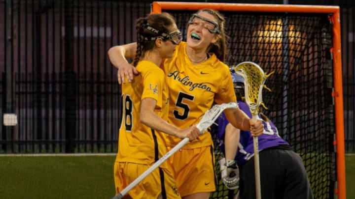 Upper Arlington girls lacrosse players celebrate scoring a goal against Hinsdale Central over the weekend. The Golden Bears won, 11-7. Upper Arlington girls lacrosse players celebrate scoring a goal against Hinsdale Central over the weekend. The Golden Bears won, 11-7.