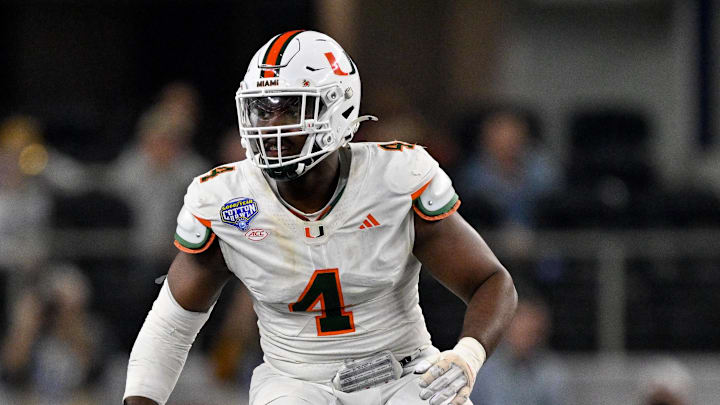 Dec 31, 2025; Arlington, TX, USA; Miami Hurricanes defensive lineman Rueben Bain Jr. (4) rushes the line during the 2025 Cotton Bowl and quarterfinal game of the College Football Playoff at AT&T Stadium. Mandatory Credit: Jerome Miron-Imagn Images