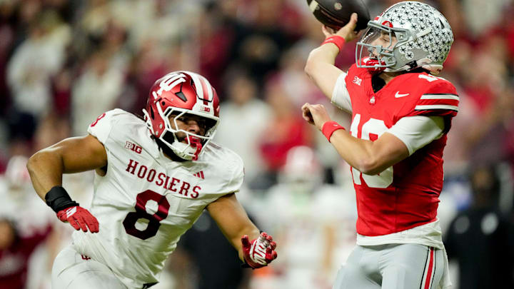 Indiana defensive lineman Stephen Daley moves in on Ohio State quarterback Julian Sayin on Dec. 6, 2025, during the Big Ten football championship at Lucas Oil Stadium in Indianapolis.
