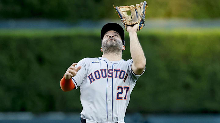 Houston Astros Jose Altuve (27) makes a catch in the outfield