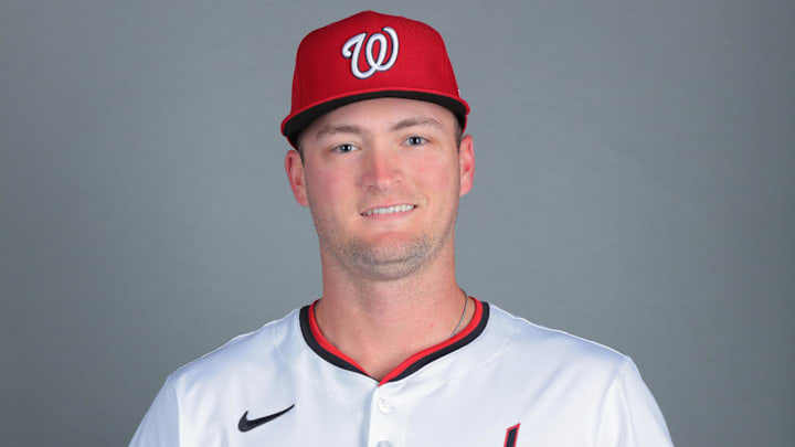 Feb 21, 2025; West Palm Beach, FL, USA; Washington Nationals pitcher Brad Lord (61) poses for a photo during picture day at CACTI Park of the Palm Beaches. 