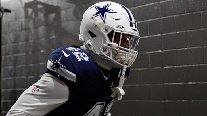 Dallas Cowboys defensive end Jadeveon Clowney runs onto the field prior to the game against the Washington Commanders.