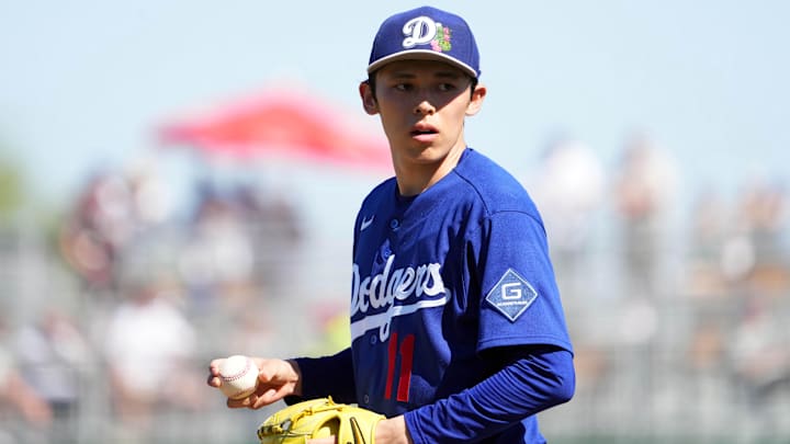 Mar 3, 2026; Goodyear, Arizona, USA; Los Angeles Dodgers starting pitcher Roki Sasaki (11) pitches against the Cleveland Guardians during the third inning at Goodyear Ballpark. Mandatory Credit: Joe Camporeale-Imagn Images