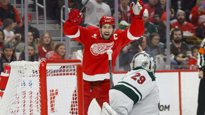 Feb 22, 2025; Detroit, Michigan, USA; Detroit Red Wings center Dylan Larkin (71) reacts to a goal scored in the second period at Little Caesars Arena. Mandatory Credit: Brian Bradshaw Sevald-Imagn Images