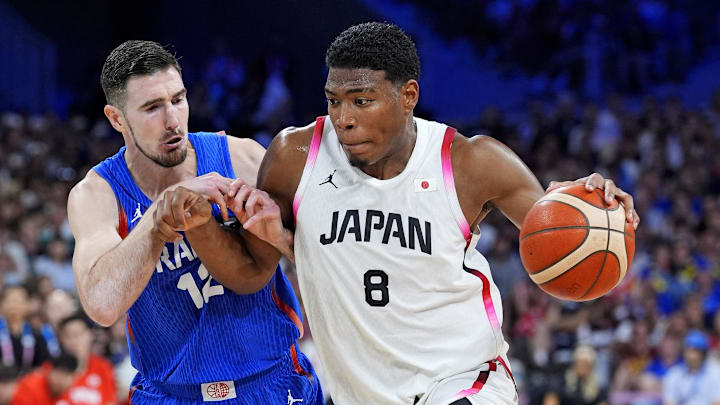Japan small forward Rui Hachimura (8) drives to the basket.