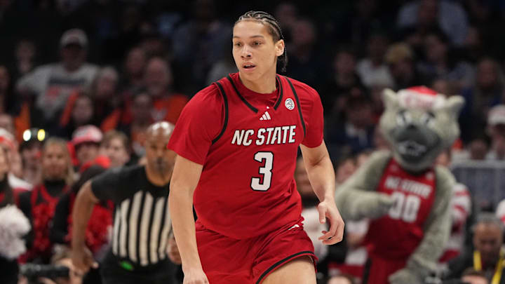 Mar 12, 2026; Charlotte, NC, USA; NC State Wolfpack guard Matt Able (3) brings the ball up the court in the first half at Spectrum Center. Mandatory Credit: Bob Donnan-Imagn Images