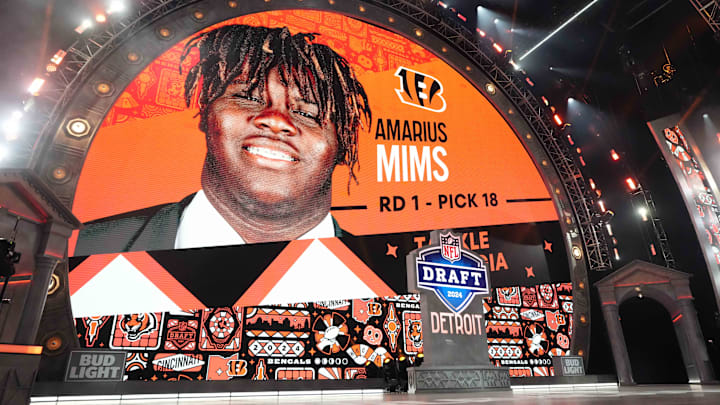 Apr 25, 2024; Detroit, MI, USA;  Georgia Bulldogs tackle Amarius Mims is selected as the No. 18 pick of the first round by the Cincinnati Bengals during the 2024 NFL Draft at Campus Martius Park and Hart Plaza. Mandatory Credit: Kirby Lee-Imagn Images
